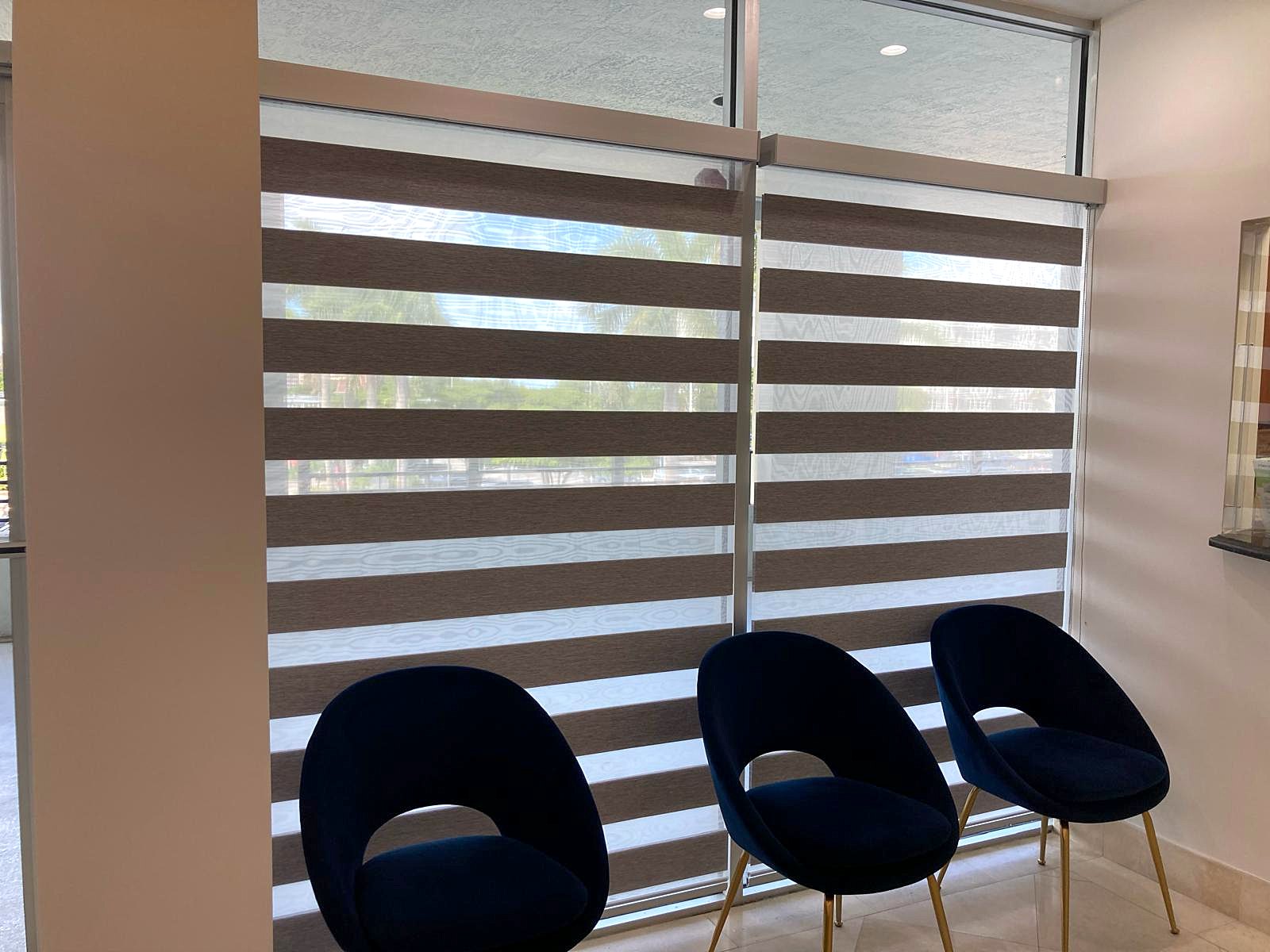 Zebra dual shades in a Miami office waiting room, installed by Lavalle Shades